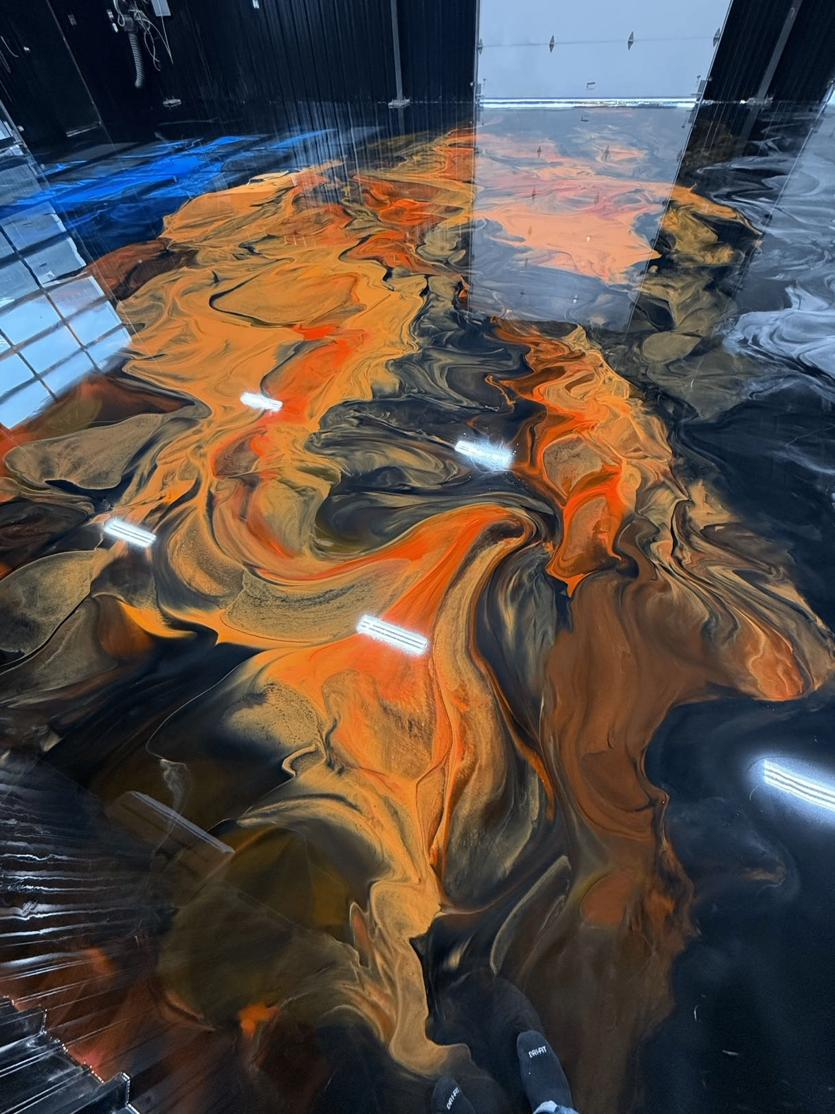 Copper & Obsidian metallic epoxy floor by Ellett Epoxy