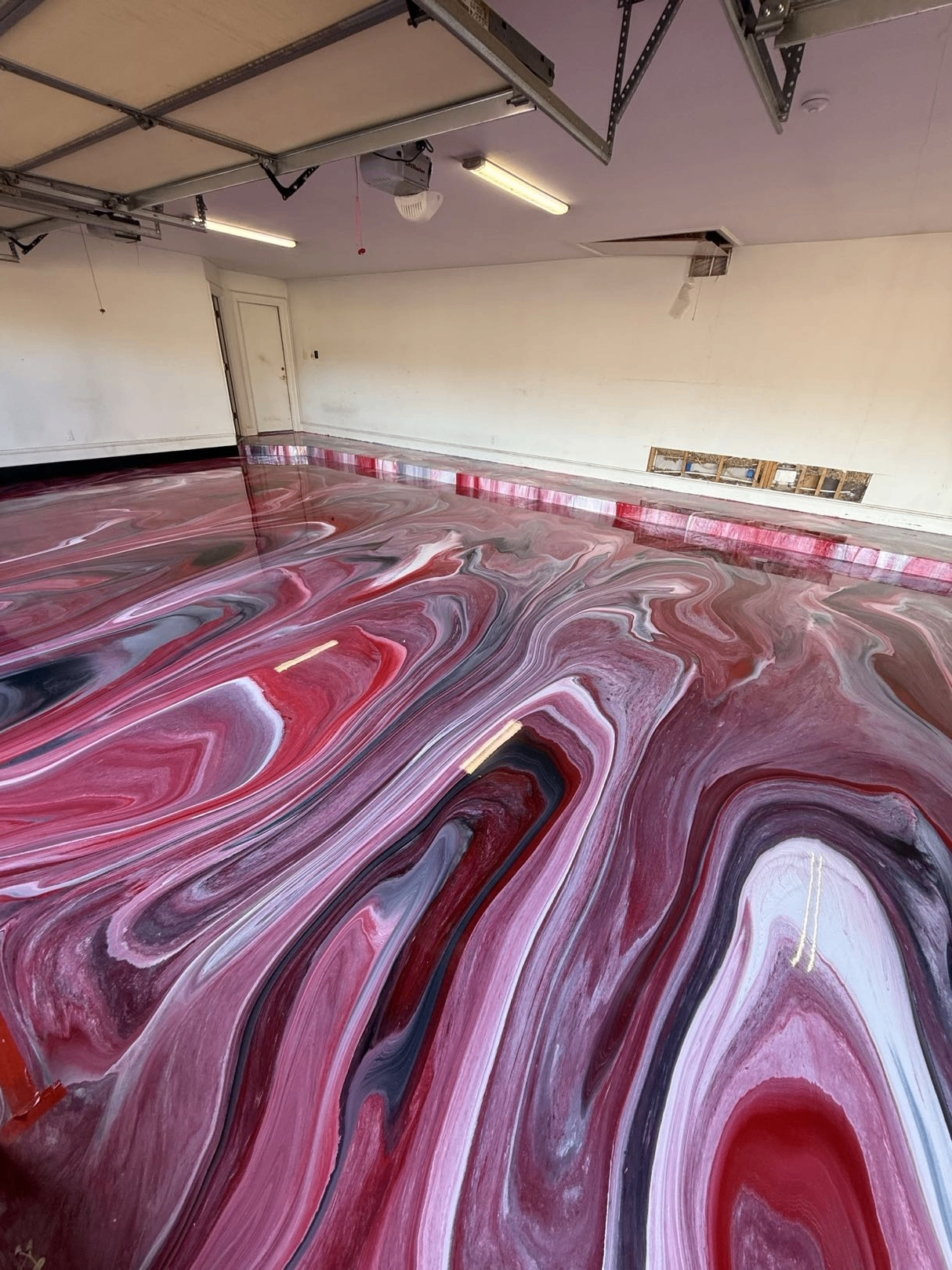 Crimson Tide metallic epoxy floor by Ellett Epoxy